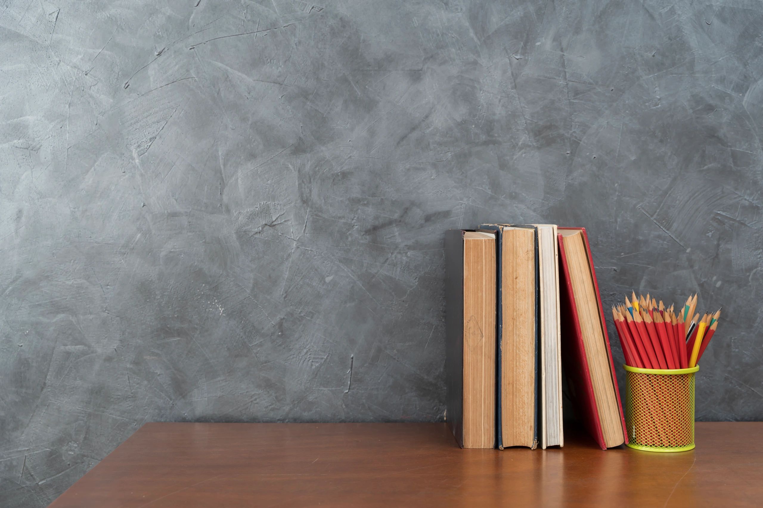 Desk with books illustrating a reflective editorial perspective